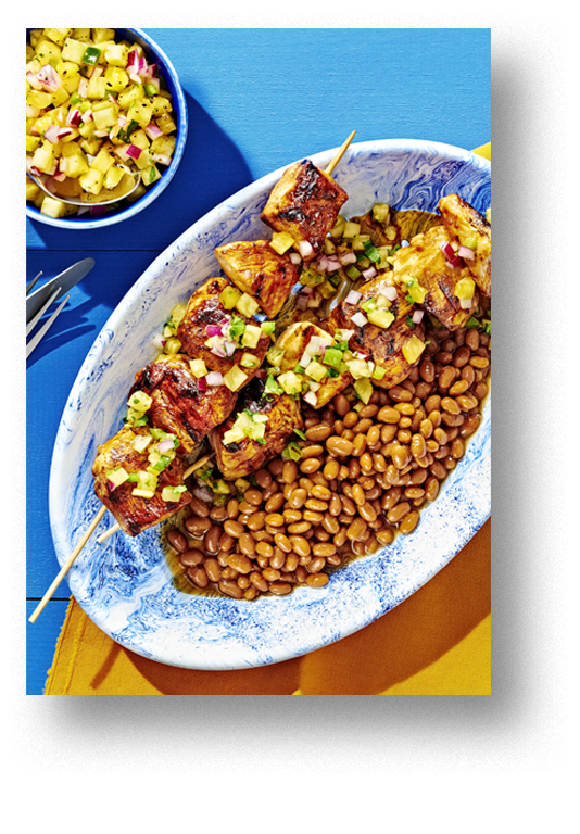 Chicken skewers paired with Baked Beans