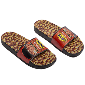 Slides sandals with the surface printed in a photo pattern of baked beans and the straps like a Bush's Baked Beans can