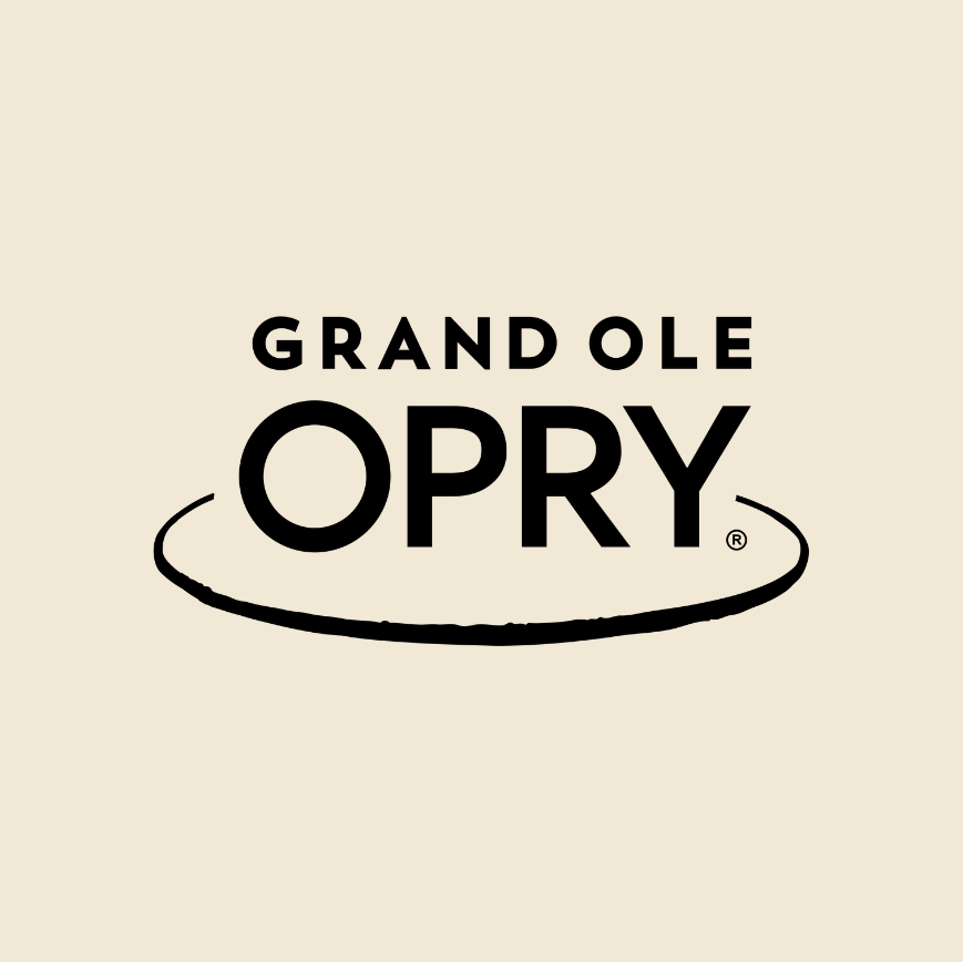 The Grand Ole Opry logo on a tan background