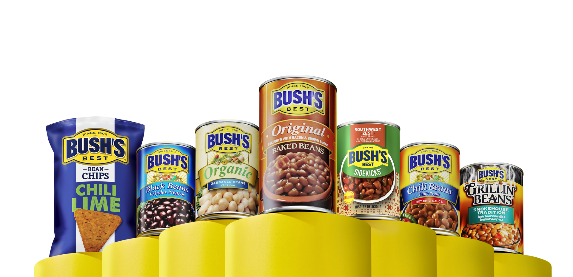 Cans of Bush’s beans and one bag of Bush’s bean chips arranged on a platform of yellow columns