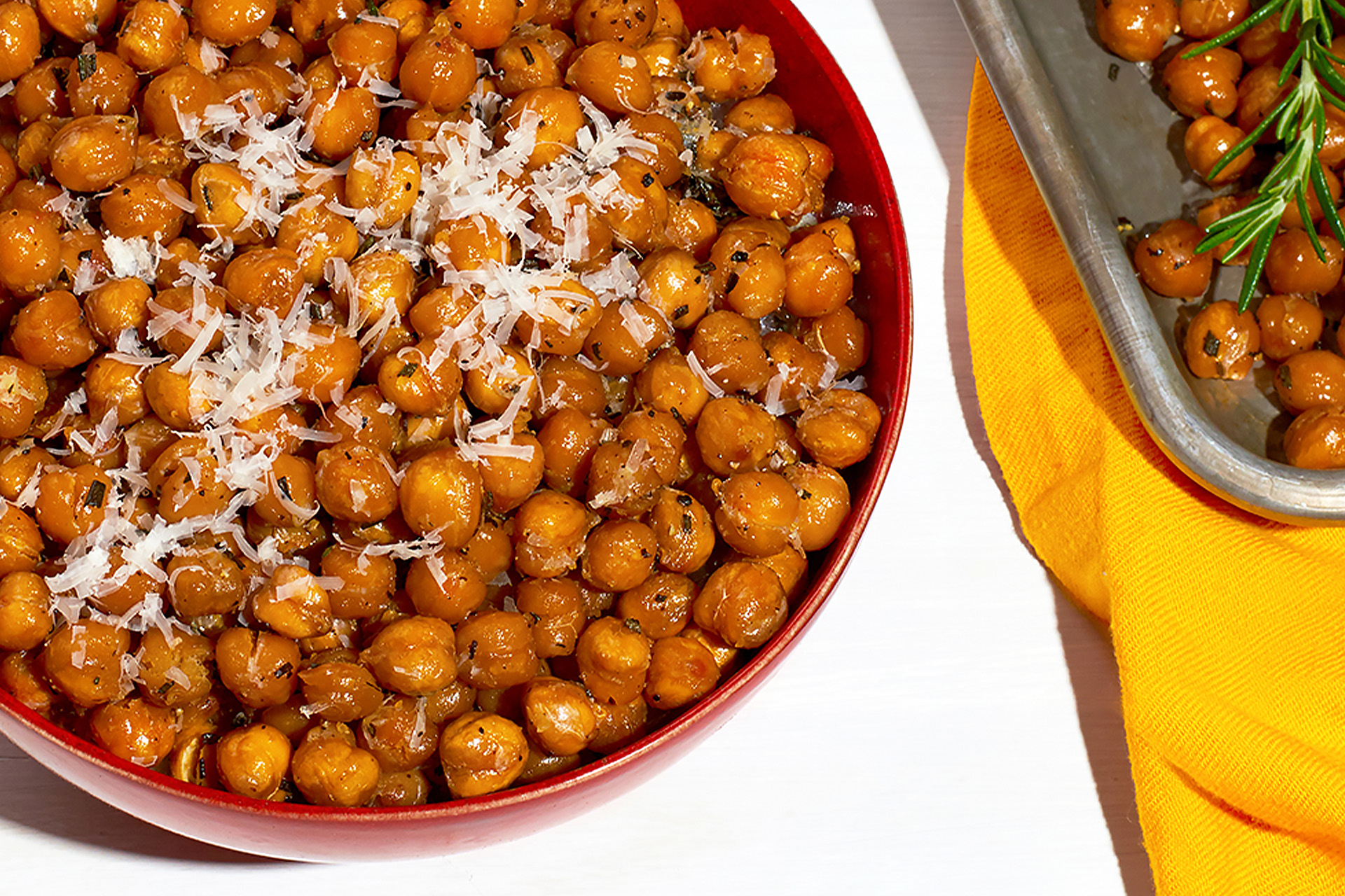 Oven roasted crunchy chickpeas with rosemary and parmesean in bowl