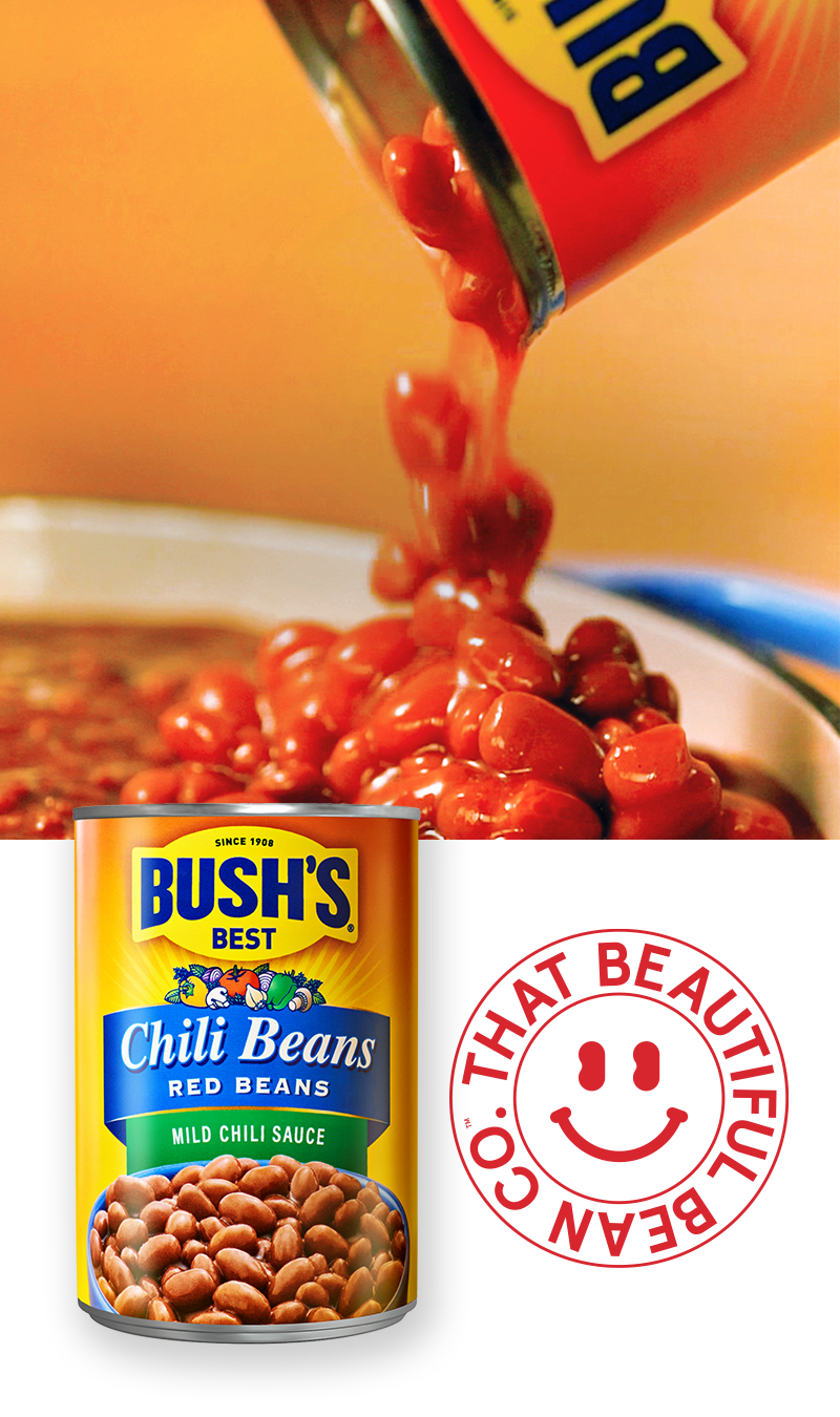 Can of bean being poured into pot with a can of Bush’s Red Chili Beans in a mild chili sauce and a Beautiful Bean Co. smiley face sticker 