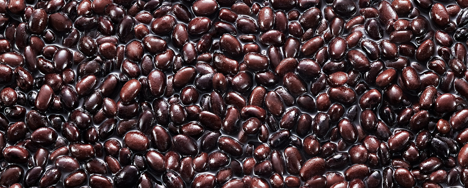 A close-up of a large batch of black beans