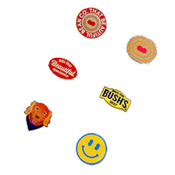 Six Bush's Beans related enamel pins.