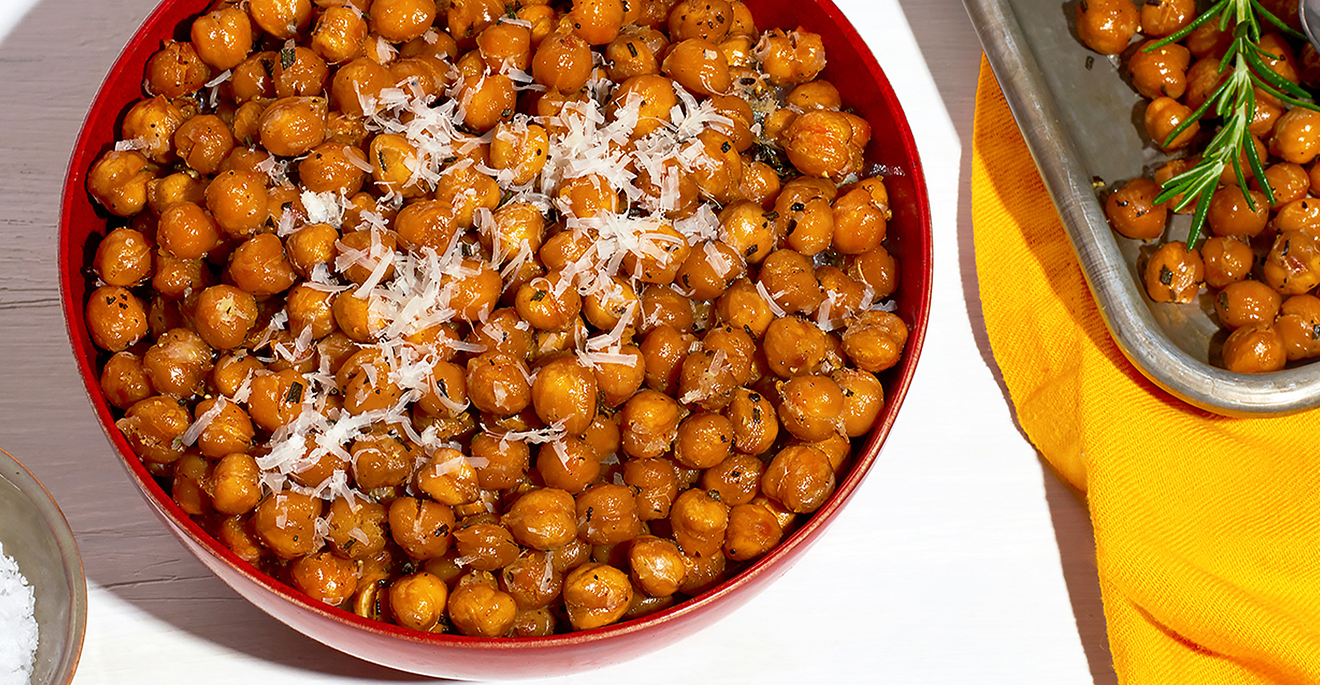 Oven roasted crunchy chickpeas with rosemary and parmesean in bowl